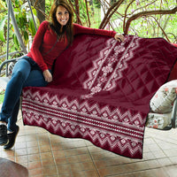 Wine red quilt blanket with quilted diamonds and white folk medallion and zigzag trim