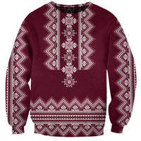 Unisex wine-red sweatshirt with white folk embroidery pattern across chest and hem