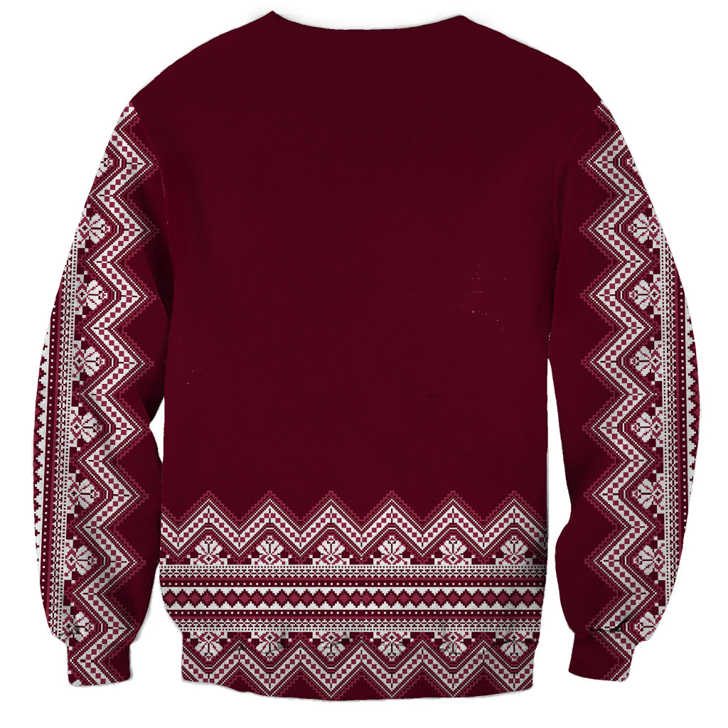 Unisex wine-red sweatshirt with white folk border pattern on sleeves and bottom