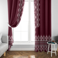Wine red folk patterned window curtains framing a glass door, white border bands at hem