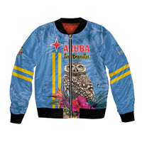 Blue bomber jacket with owl graphic, red star and zipper, black ribbed cuffs and hem.