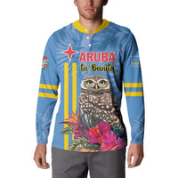 Men's blue button sweatshirt on model: front owl graphic with tropical flowers and stripes.