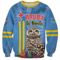 Blue unisex sweatshirt with owl tropical graphic, yellow-striped cuffs and hem.