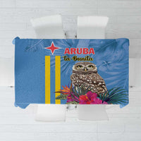 Blue tropical tablecloth with yellow stripes, pink flowers, and owl graphic