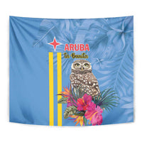 Blue tropical owl tapestry wall hanging close-up with palm leaves and pink flowers