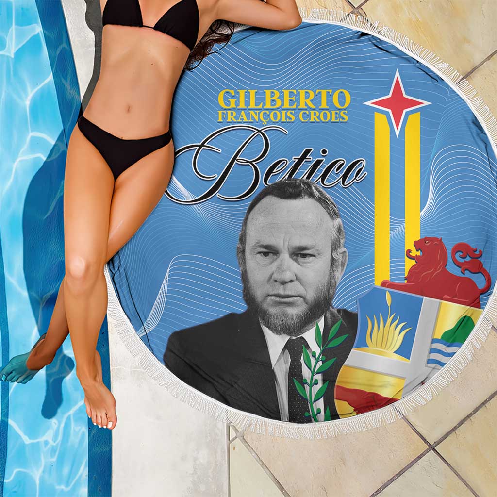 Round blue beach blanket with fringe edge, portrait center and flag-style emblem design