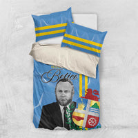 Blue printed duvet and two matching pillows with yellow stripes and flag emblem