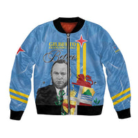 Blue bomber jacket with front zipper, black ribbed trim, and flag-style graphic front