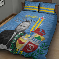Blue quilt bed set with two pillows, Betico portrait over flag crest
