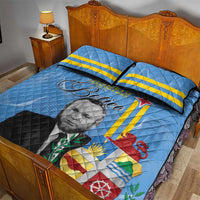 Blue quilt bed set with two pillows and Betico portrait, flag cross and emblem