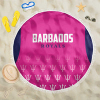 Pink round Barbados Royals beach blanket with white fringe and trophy pattern