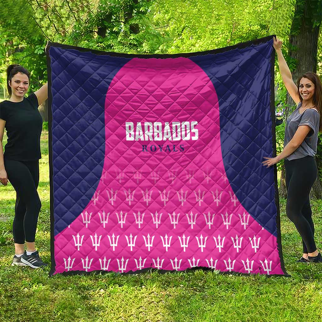 Quilted cricket blanket in navy and pink with “Barbados Royals” crest and trophy pattern.