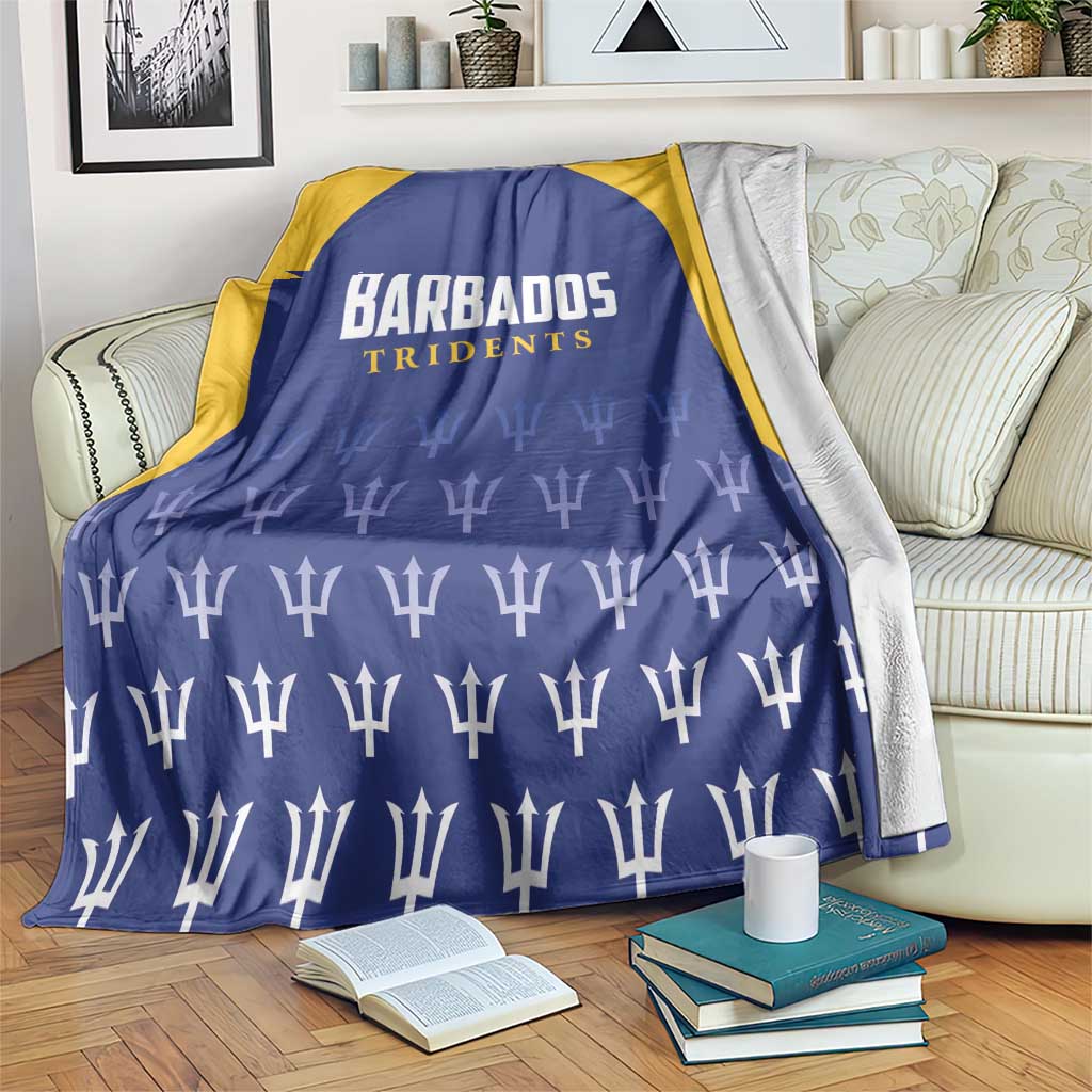 Barbados Tridents cricket blanket, blue with yellow border and repeating trophy pattern
