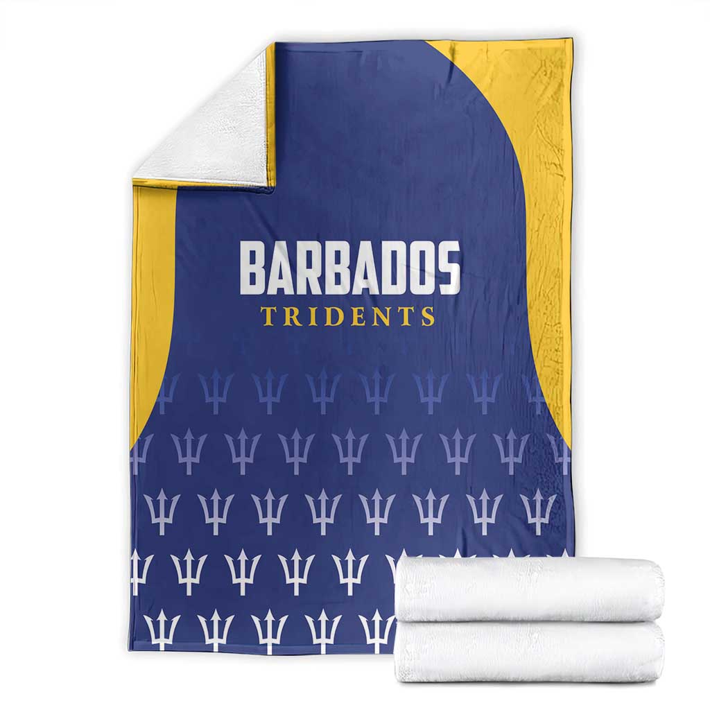 Barbados Tridents cricket blanket folded, blue with yellow border and repeating trophy design