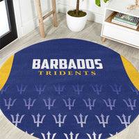 Round blue cricket carpet with Barbados Tridents text and repeating trident pattern