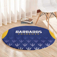 Round blue cricket carpet with Barbados Tridents lettering and repeating trident symbols