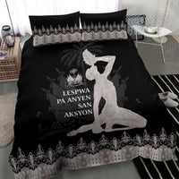 Bedding set: black duvet cover with silver hem and border pattern, two pillows with print