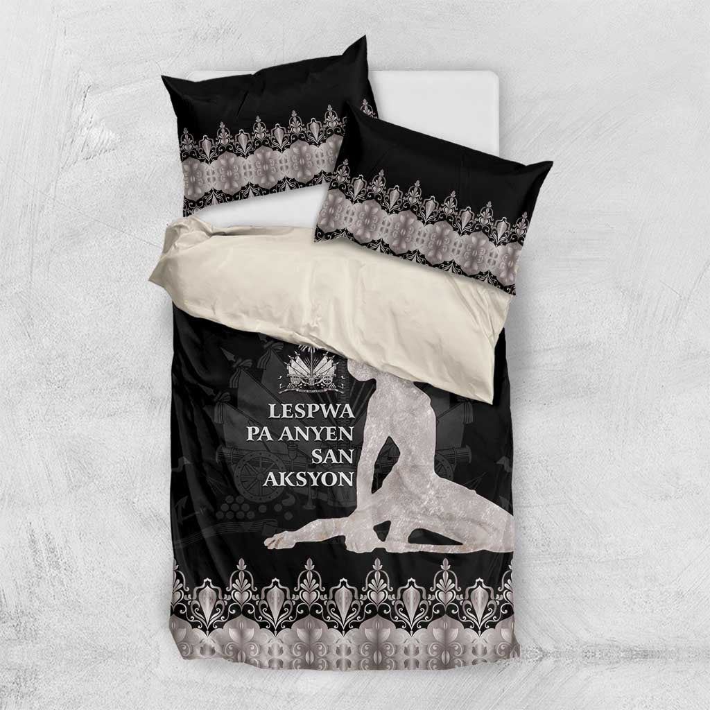 Bedding set on white surface: black duvet cover with silver border and two pillowcases