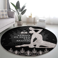 Round area rug with black field, gray island silhouette, and decorative damask border