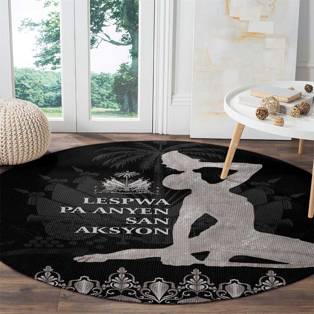 Round area rug in black with gray map silhouette, central text, and floral damask trim