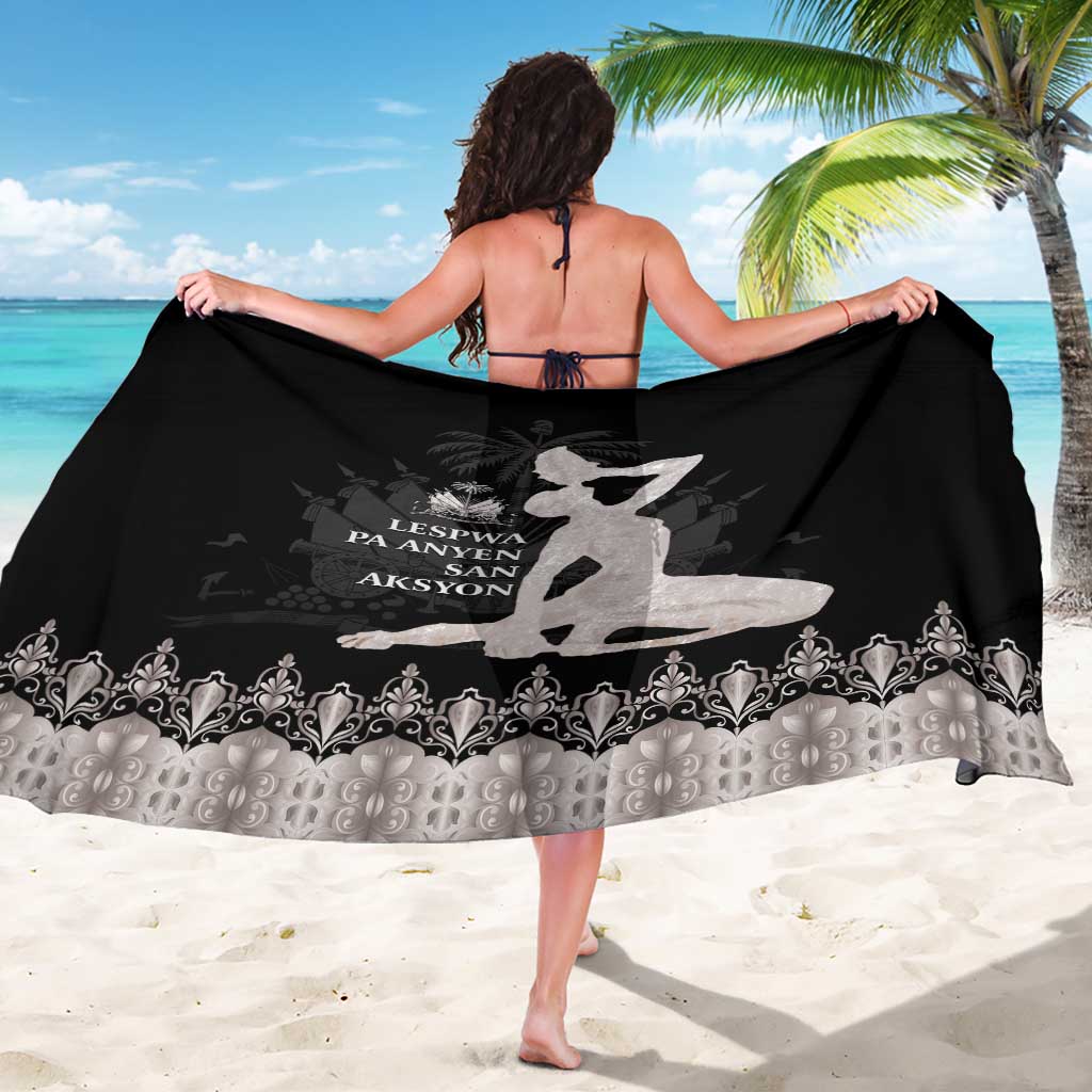 Black sarong with gray dancer emblem, decorative border pattern, back view