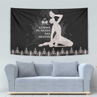 Black tapestry showing seated woman art with silver text and decorative bottom border