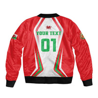 Red bomber jacket, black ribbed hem and cuffs, white back design with LT01 and green text
