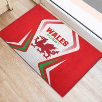 Red Wales Rugby doormat with Wales Rugby lettering and dragon crest in close-up