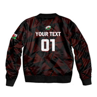 Black bomber jacket with red plaid, sleeve Wales flag patch, back text "YOUR TEXT 07"