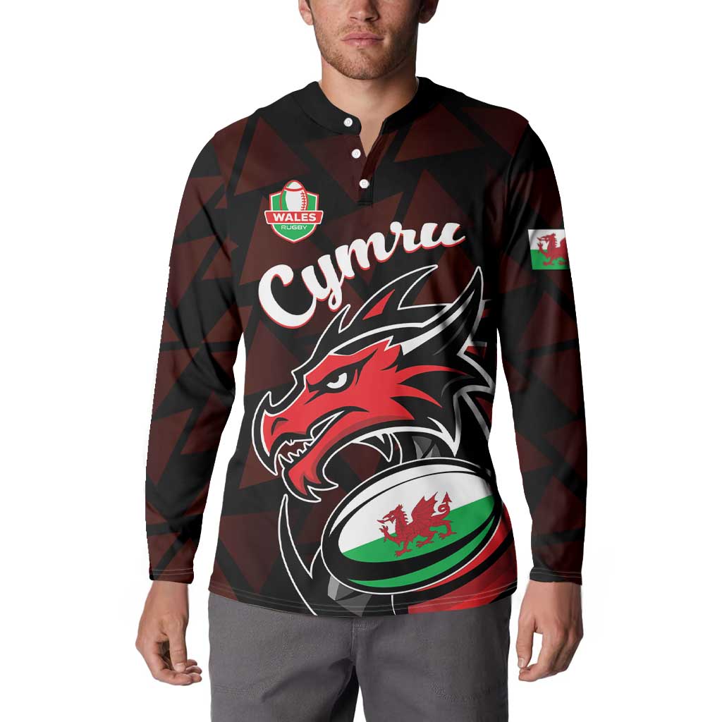 Men's rugby button sweatshirt on model, black maroon geometric print with Cymru dragon graphic