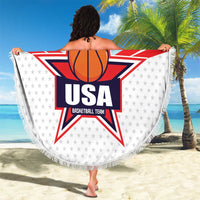 Round beach blanket with USA basketball star logo, fringed edge, held on sandy beach
