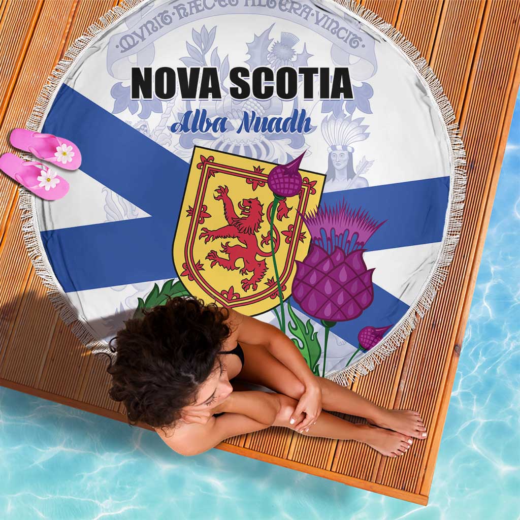 Round beach blanket with Nova Scotia crest and flag stripes, fringed border