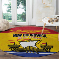 Round area rug with New Brunswick wordmark and ship illustration, red yellow and blue bands