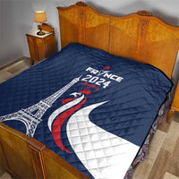 Blue France 2024 quilt blanket with Eiffel Tower, rooster, and crescent moon print on bed