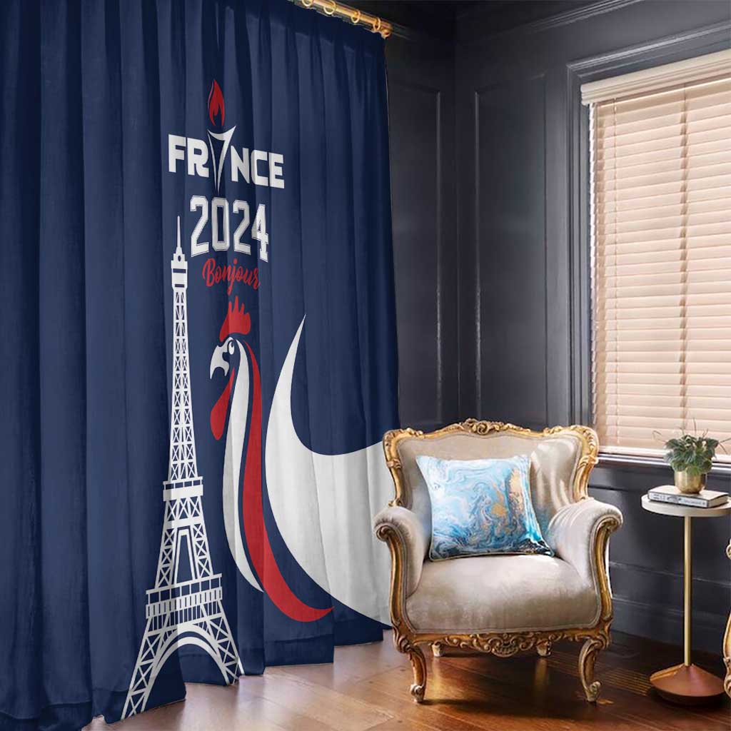 Blue French-themed window curtain with Eiffel Tower and rooster graphic beside lounge chair