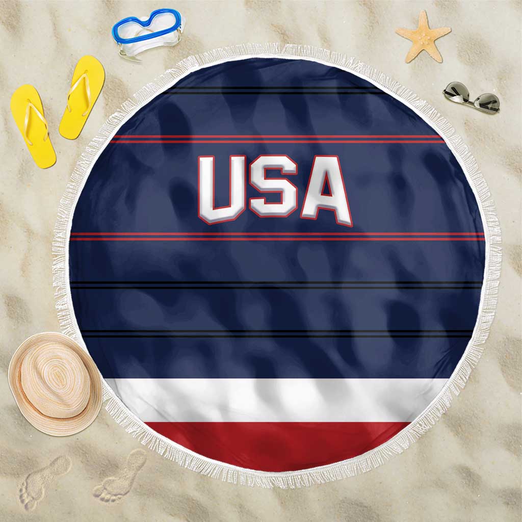 Round USA beach blanket with navy stripes, red/white border, and white fringe edge