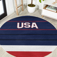 Round blue carpet with USA logo text and red-white border rings