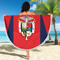 Red round fringe football beach blanket with Los Canaleros crest, fully spread