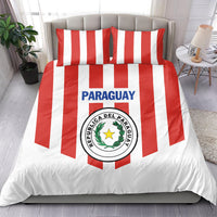 Paraguay 2024 football bedding set on bed with red-and-white striped pillows and crest
