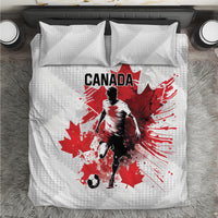 White Canada-themed soccer bedding set with red player graphic and maple leaves, plus two pillows
