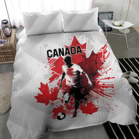 White duvet with red Canada soccer player graphic and two square pillows