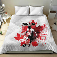 White bedding set with red Canada soccer player graphic and two pillows