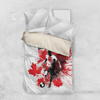 White bedding set showing red Canada soccer player duvet and matching pillowcases