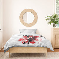 White duvet and pillow with red Canada soccer player graphic