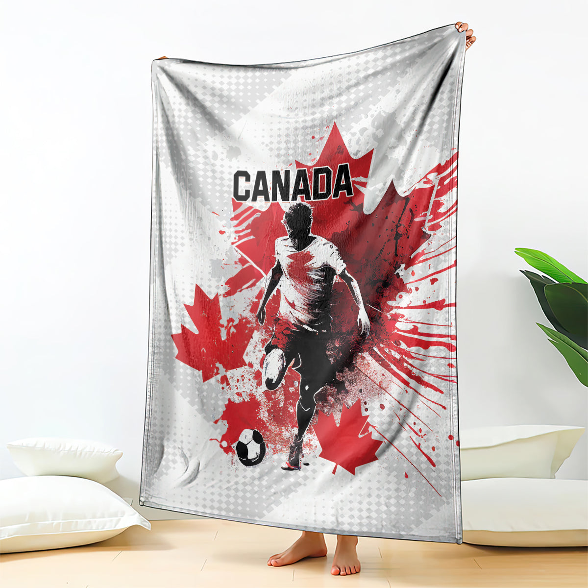 Canada soccer blanket, white-and-gray with large red maple leaf and player graphic