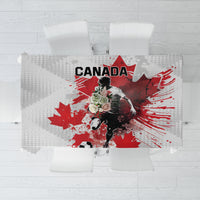 Canada-themed tablecloth with red maple leaf and hockey player graphic, white background