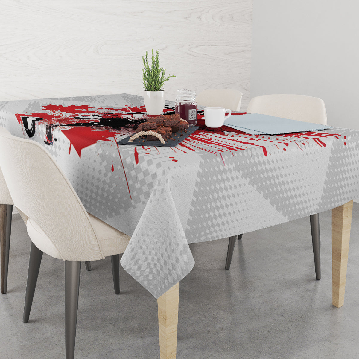 Rectangular Canada tablecloth in white with red-and-black player and maple leaf print