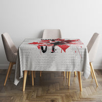 Canada-themed white tablecloth with red maple leaf and hockey player design
