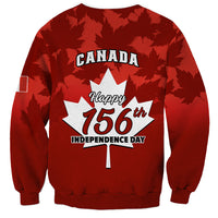 Red unisex sweatshirt with repeating maple leaf print and “Happy 156th Independence Day” logo