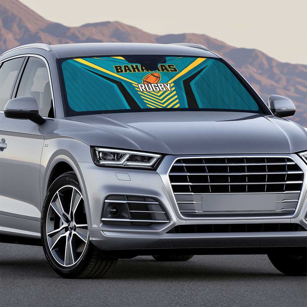 Blue auto sun shade with Bahamas Rugby logo installed on car windshield